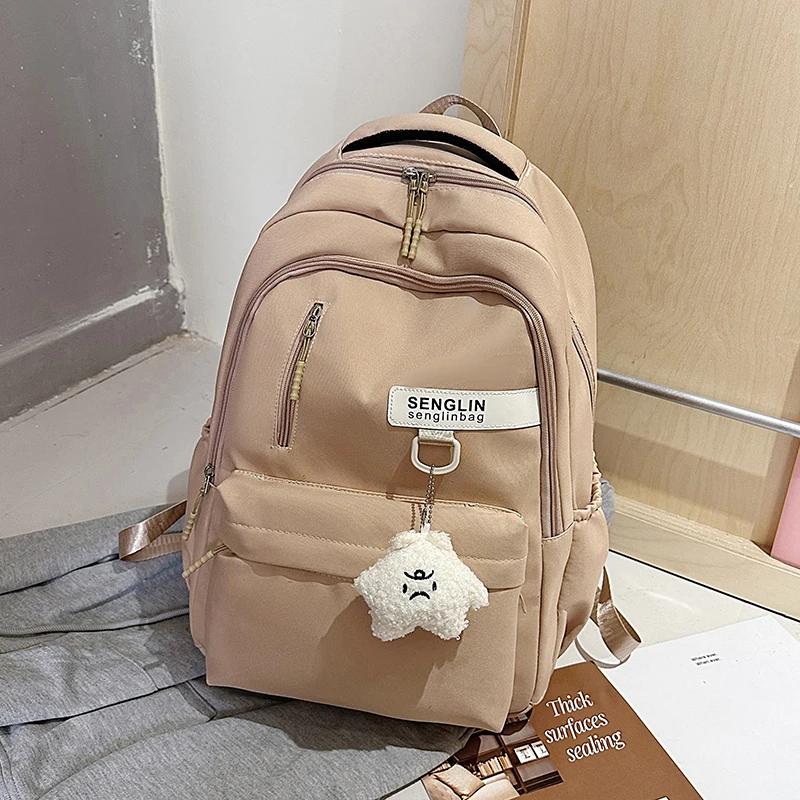 Trendy Red Backpack for Women Large Capacity Lightweight School Bag Casual Travel and Daily Commuter Bag with Cute Pendant - Imagen 7