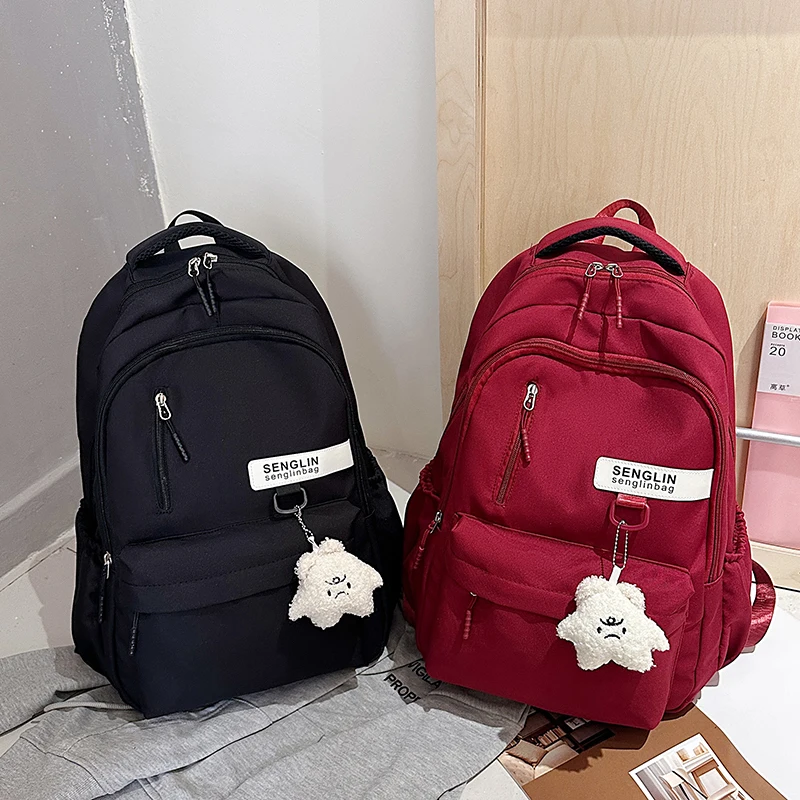 Trendy Red Backpack for Women Large Capacity Lightweight School Bag Casual Travel and Daily Commuter Bag with Cute Pendant - Imagen 4