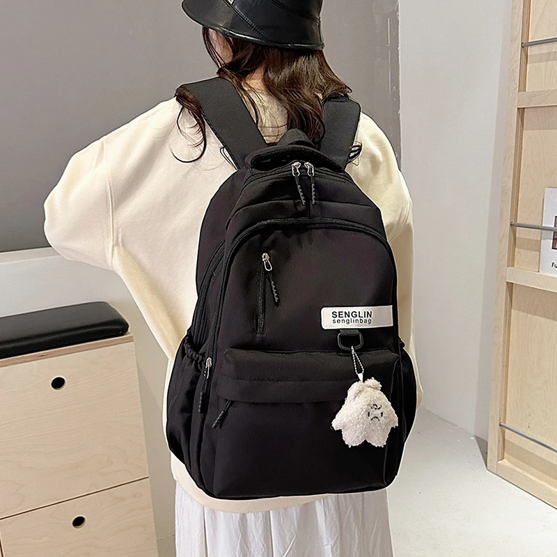Trendy Red Backpack for Women Large Capacity Lightweight School Bag Casual Travel and Daily Commuter Bag with Cute Pendant - Imagen 3