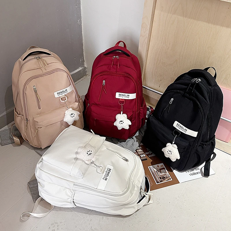 Trendy Red Backpack for Women Large Capacity Lightweight School Bag Casual Travel and Daily Commuter Bag with Cute Pendant - Imagen 2
