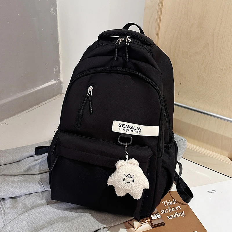 Trendy Red Backpack for Women Large Capacity Lightweight School Bag Casual Travel and Daily Commuter Bag with Cute Pendant - Imagen 5