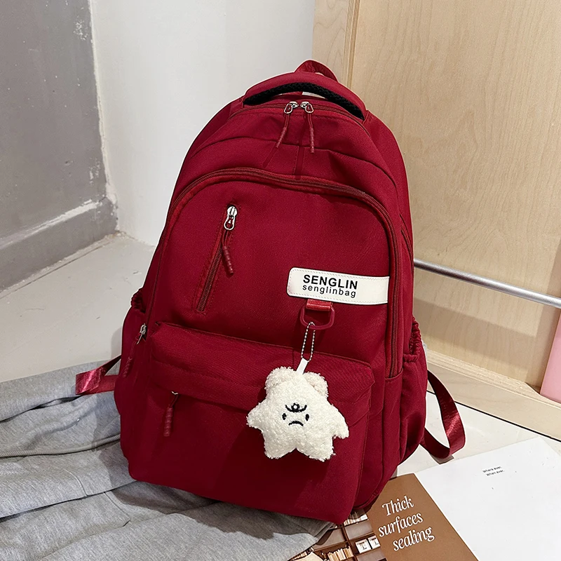 Trendy Red Backpack for Women Large Capacity Lightweight School Bag Casual Travel and Daily Commuter Bag with Cute Pendant - Imagen 6